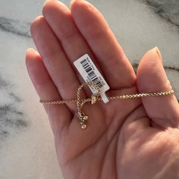 Gold and rhinestone diamond bracelet with toggle close - Picture 2 of 4